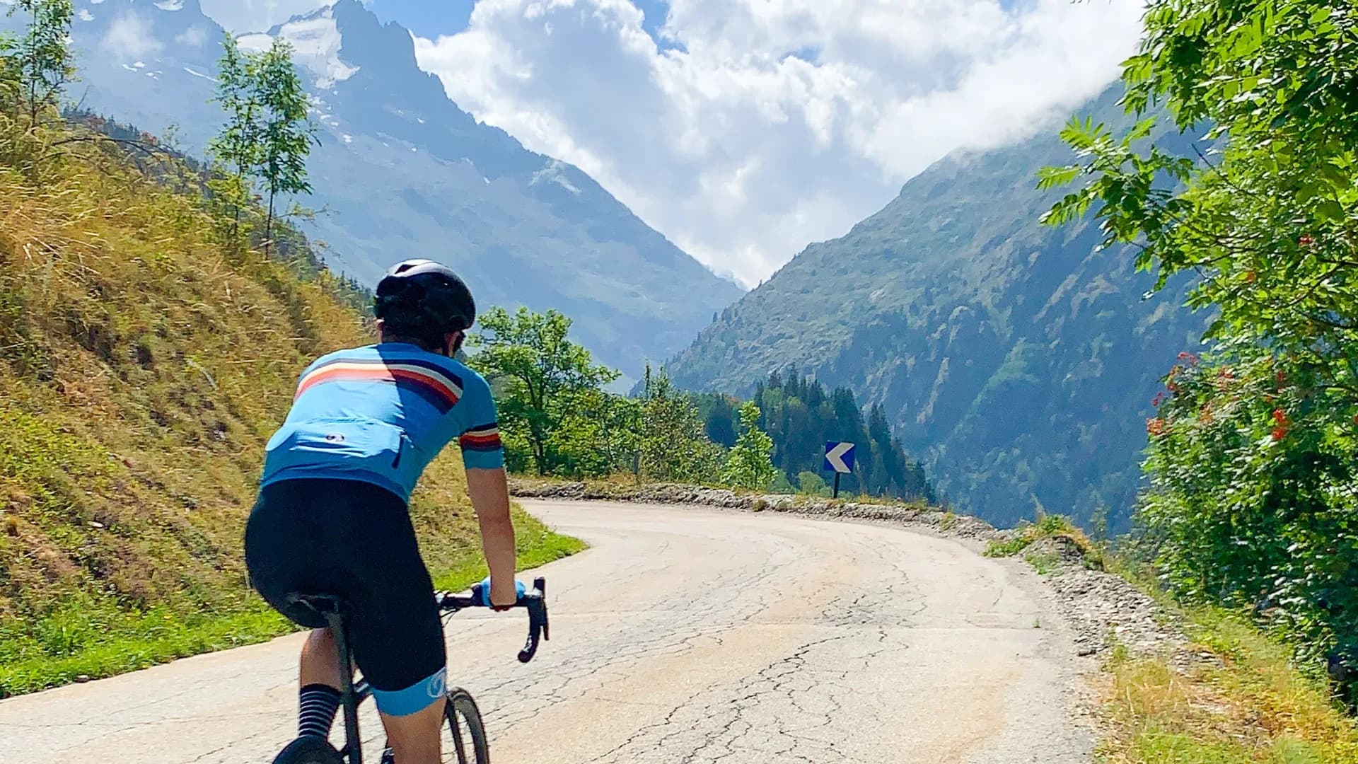 Cyclist climbing in the mountains